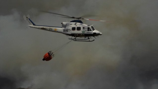 Forest fires ravaging southern Spain