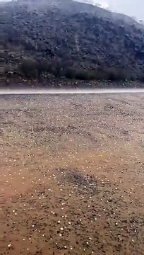 أمطار غزيرة مصحوبة بالبرد على رجال_ألمع منطقة عسير