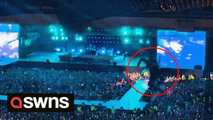 Horror moment fan plunges from top balcony at Harry Styles gig