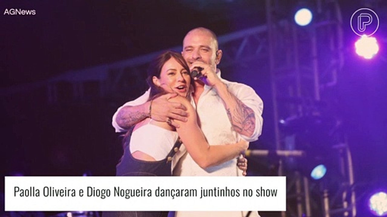 Paolla Oliveira e Diogo Nogueira trocam olhares apaixonados, dão beijo e levam público à loucura em show