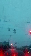 Cars are standing at a traffic light in our city in winter