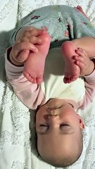 Baby Falls Asleep Holding Her Feet