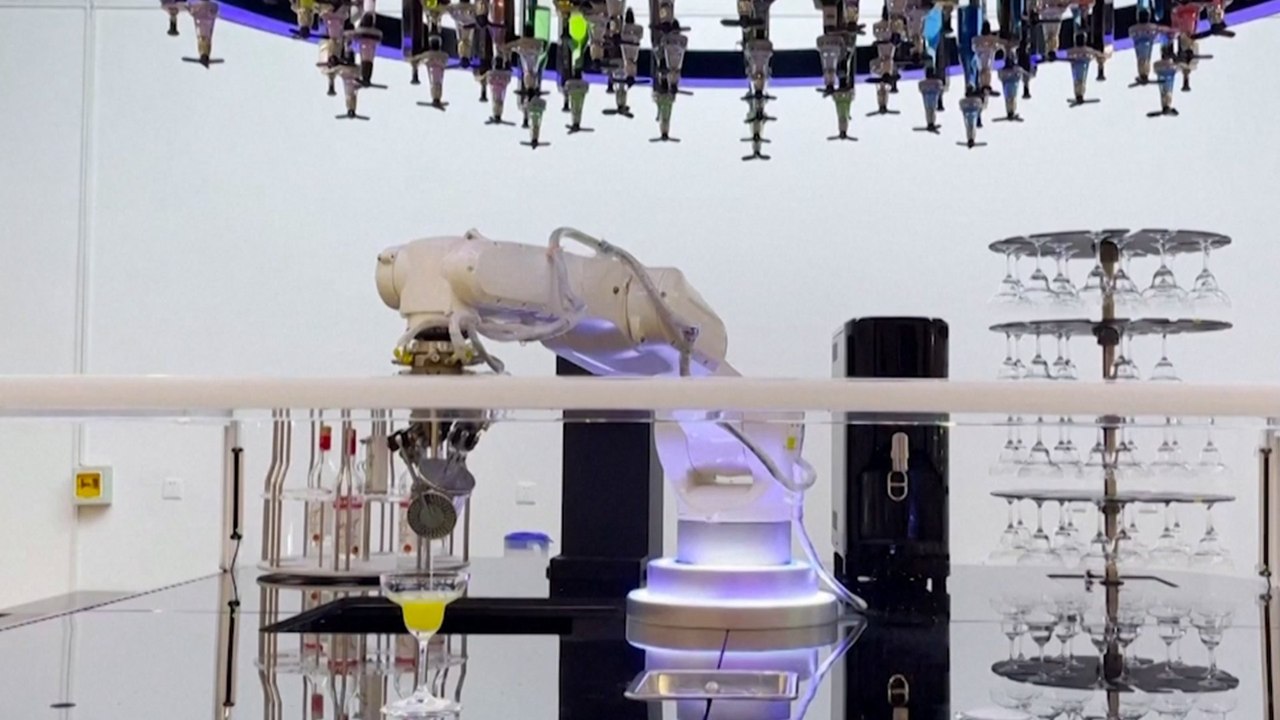 Robot bartender serves drinks at the Beijing Winter Games