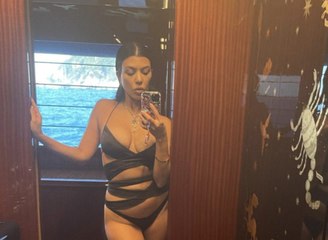 Kourtney Kardashian Wore the Swimsuit Version of Kendall Jenner's Shredded Wedding Guest Dress