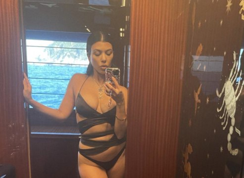 Kourtney Kardashian Wore the Swimsuit Version of Kendall Jenner's Shredded Wedding Guest Dress