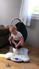 Baby Jax Struggles to Stay Awake in Rocker