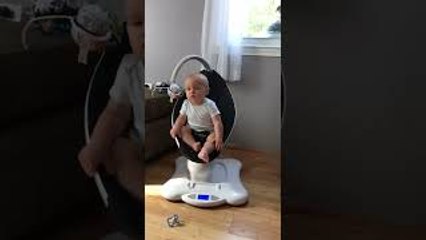 Baby Jax Struggles to Stay Awake in Rocker