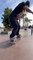 Guy Does Skateboarding Trick While Wearing Roller Skates After Failing Several Times
