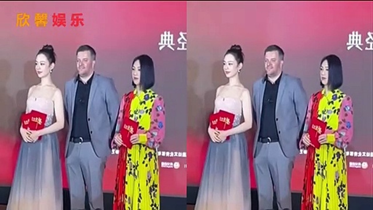 吉娜现身巴黎时装秀，黑色吊带长裙太吸睛，芭比脸好精致