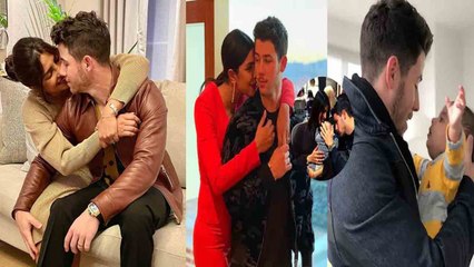 Priyanka Chopra ने पहली बार दिखाया बेटी का चेहरा, पापा Nick की गोद में दिखीं लाडली | FilmiBeat