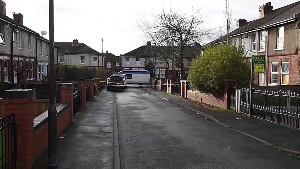 Police at the scenes of two shootings in Leigh