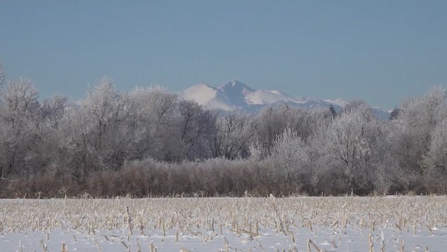 Snow spreads from the Rockies to the Plains