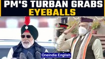 PM Modi wears turban to NCC rally, after sporting U'khand cap, Manipur stole | Oneindia News