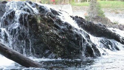 FLOWING MURKY WATER