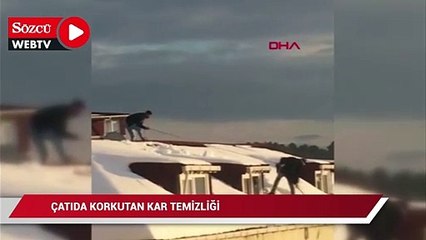 Arnavutköy’de çatıda korkutan kar temizliği