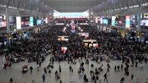 Holidaymakers pack Shanghai railway station as Lunar New Year travel rush gets under way in China