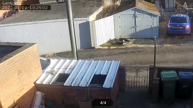 A cabbie watched as his neighbour's entire garage roof was completely lifted off and blown away during Storm Malik (SWNS)