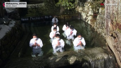 Buddhist priests bathe in cold river in annual purification ritual