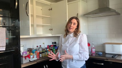 Littlehampton declutter business wins award - kitchen cupboard declutter demonstration