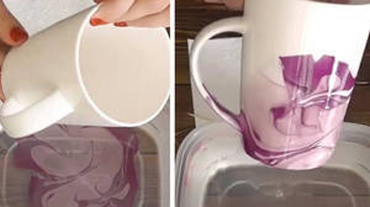 Mit einigen Tropfen Nagellack hat diese Frau eine tolle Tasse gemacht.