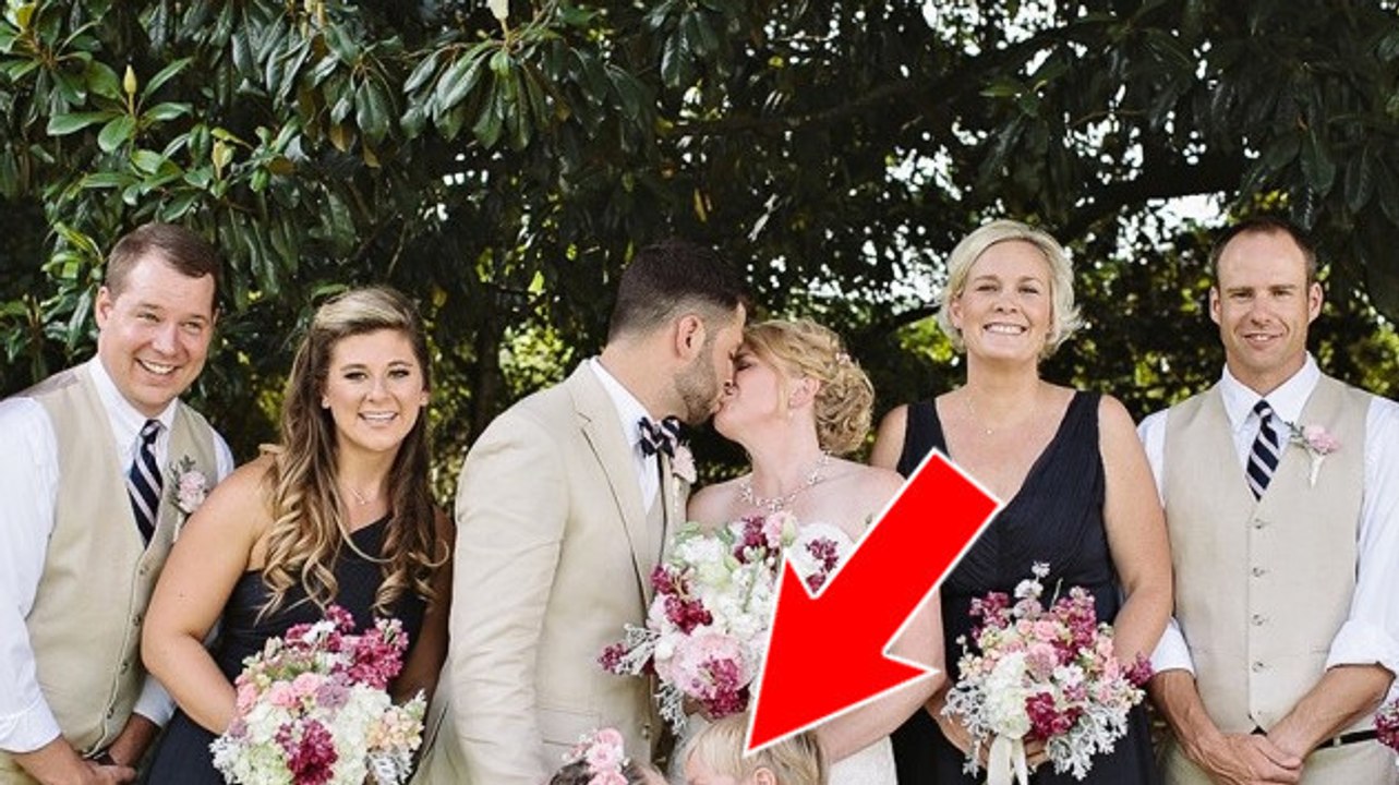 Mit diesem Kuss stiehlt das kleine Mädchen dem Brautpaar die Show