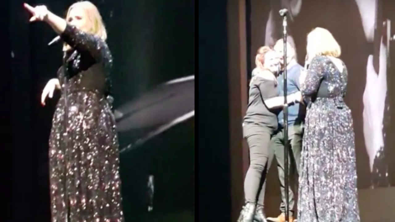 Adele holt ein Paar auf die Bühne, dass sich auf ihrem Konzert gerade verlobt hat