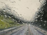 Künstler malt Bilder, die nach echtem Regen aussehen