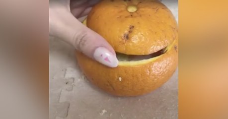 Sobald du erkennst, was in der Orange ist, wirst du lachen müssen!