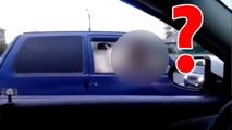 Dieses Auto, das auf einer russischen Straße gefilmt wurde, hat einen seltsamen Passagier