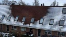 Ein Teil dieses Hausdaches bleibt schneefrei: Die Polizei macht eine erstaunliche Entdeckung