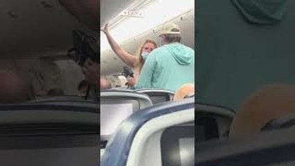 Cursing Couple Escorted Off Flight