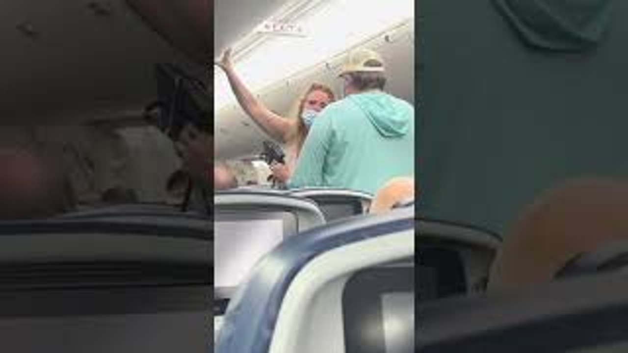 Cursing Couple Escorted Off Flight