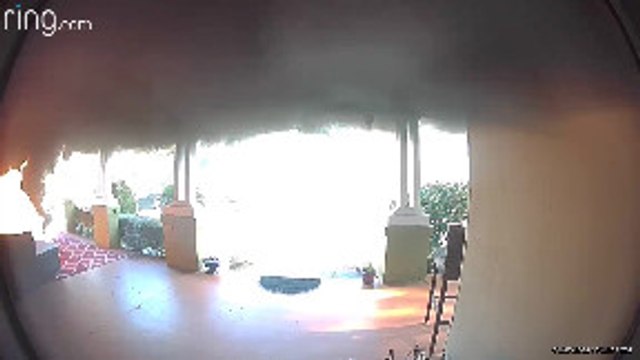 Husband Hurries to Put Out House Fire