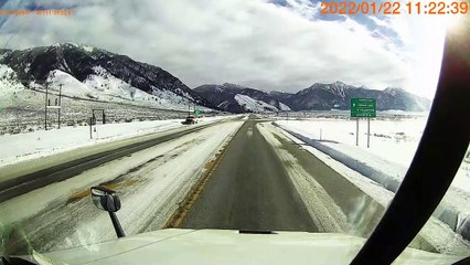 Speeding Van Can't Make Icy Turn
