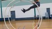 Circus Artist Shows Cool Moves While Training on German Wheel