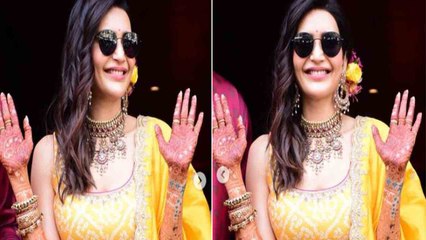 Karishma Tanna ने mehendi लगाकर दिए पोज, Yellow lehenge में दिखी खास | FilmiBeat