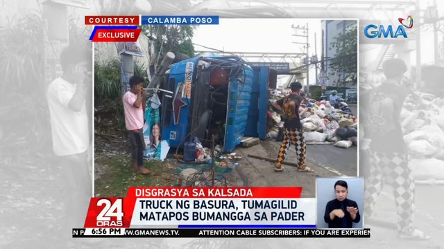 Truck ng basura, tumagilid matapos bumangga sa pader | 24 Oras