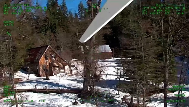 Two people and a dog rescued after nearly two months snowed in