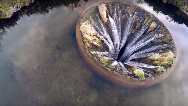 The Unbelievable Hole Found In The Middle Of A Portuguese Lake