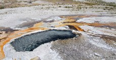 A Geyser Erupts At Yellowstone, Spewing Rubbish Thrown In By Tourists Over 80 Years Ago