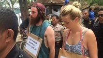 Two Australian Tourists Accused Of Theft Are Forced To Do ‘The Walk Of Shame’ In Indonesia
