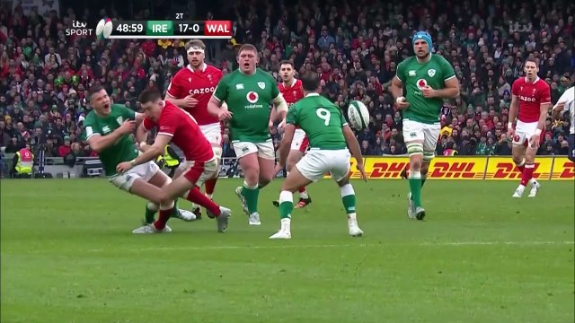 Josh Adams gets yellow carded for a dangerous hit on Jonathan Sexton