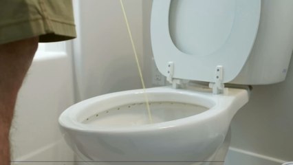 Is it normal for men to pee while sitting down?