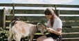 Girl Feeding goat
