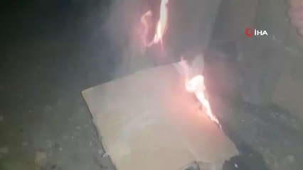 Aracını dondurucu soğuklardan korumak için tenekede ateş yakıyor