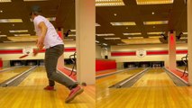 'MIND-BOGGLING footage of man scoring a strike by throwing DISC at bowling pins '