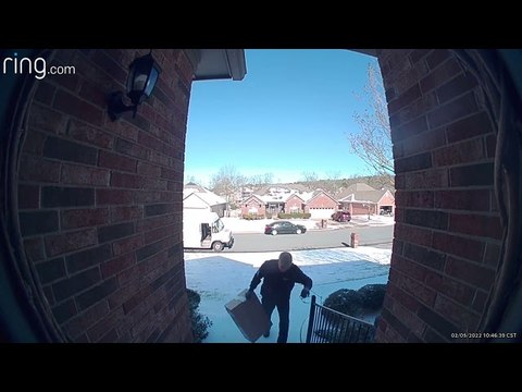 FedEx Delivery Man Slides Down Front Yard