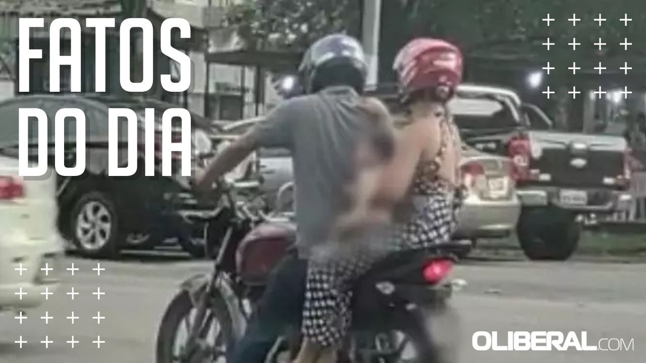 Casal com bebê é flagrado avançando sinal em moto