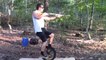 Person Attempts Shooting From Shotgun On Unicycle