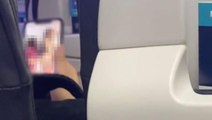Uçakta cinsel içerikli film izleyen adam, kadın yolcuya yakalandı! Tepkiler art arda geldi
